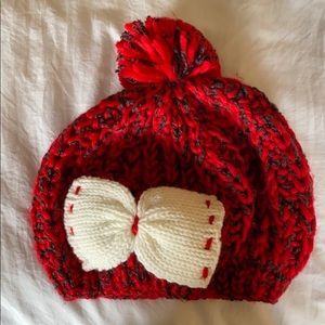Red pom beanie with bow detail